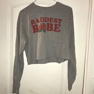 Grey (with wording) long sleeve cropped top.